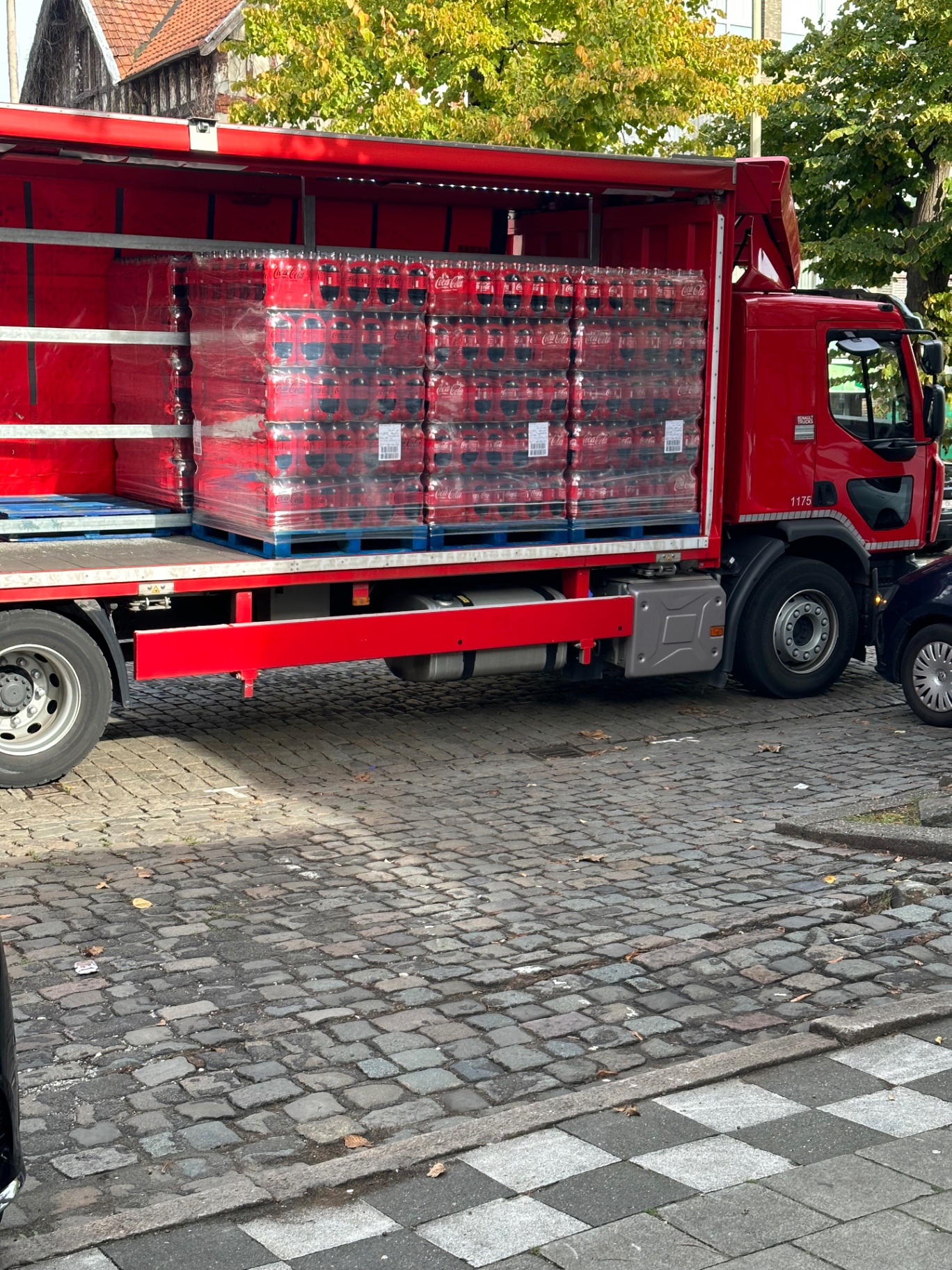 Mix Drink BV loading Coca-Cola pallets into a delivery truck